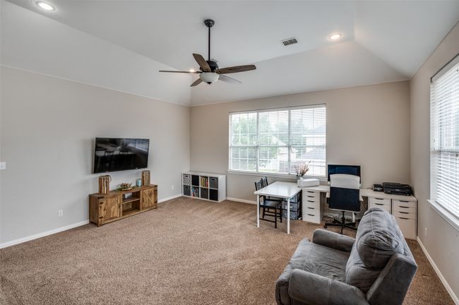 Living room featuring vaulted ceiling, healthy amount of natural light, carpet floors, ceiling fan, and recessed lighting | Image 18