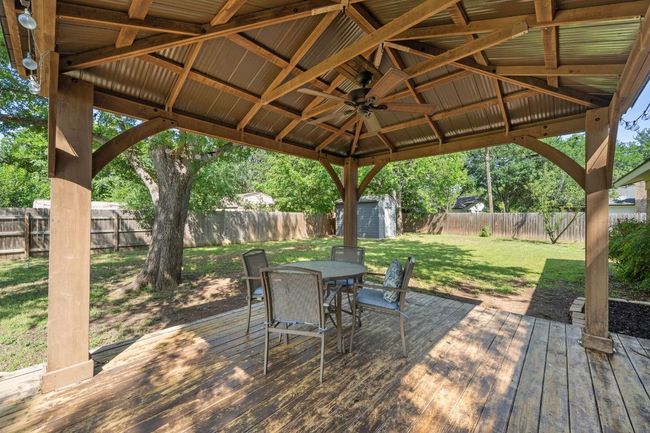 Far back right corner has an additional shed perfect for lawncare equipment and more. | Image 32