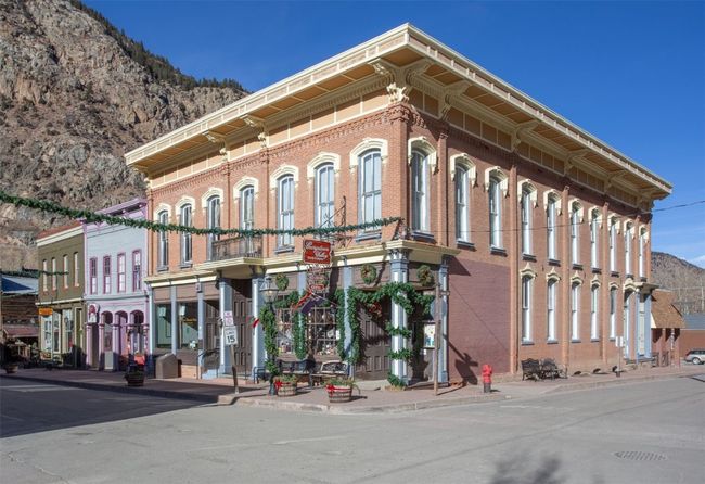 View of building exterior with a mountain view | Image 20