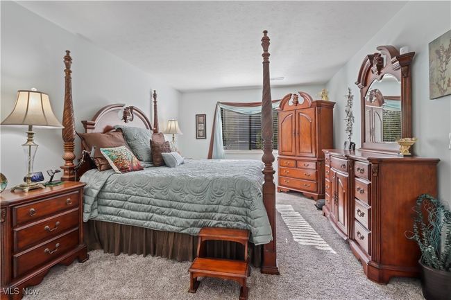 Bedroom with light colored carpet | Image 15