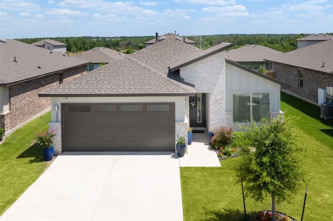 View of front of the house with front entry garage | Image 4