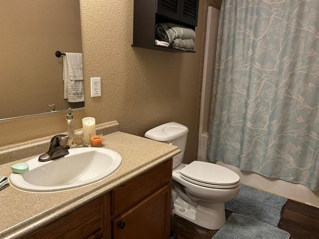 Secondary Bath: Tub/Shower Combo, Vanity Area | Image 26