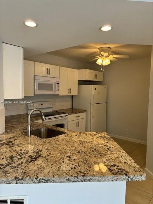 103-8977 Wiles Rd, Coral Springs, FL, 33067-1804 | Card Image