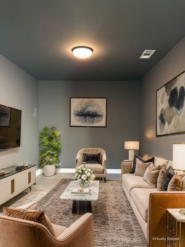 Living room featuring visible vents and baseboards | Image 8