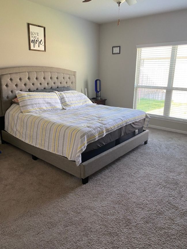Bedroom featuring carpet and ceiling fan | Image 13