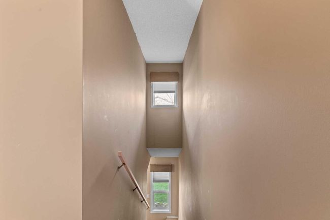 64 Citadel Meadow Gdns Nw, Townhouse with 3 bedrooms, 3 bathrooms and 2 parking in Calgary AB | Image 16