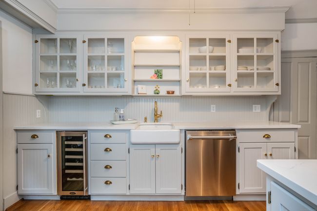 Stunning, updated &amp; charming...what a combination! Stainless appliances including a wine fridge as well as a farm sink. | Image 8