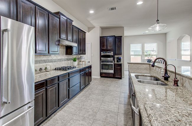 Modern Kitchen Equipped with Stainless Steel Appliances, Including a Gas Cooktop, Perfect for Culinary Enthusiasts | Image 14