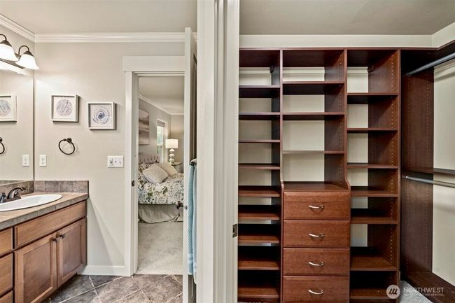 Primary walk-in-closet with organization | Image 16