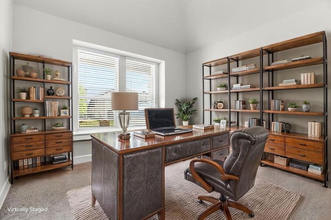 Office featuring baseboards and dark aggregate flooring | Image 19