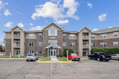 Welcome Home to a fabulous top floor south facing condo with gorgeous nature views | Image 1