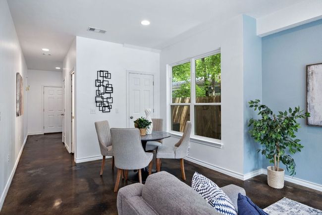 There's an ample storage closet under the stairs. | Image 7