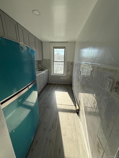 2-90-28 75 Street, New York, NY, 11421 | Card Image