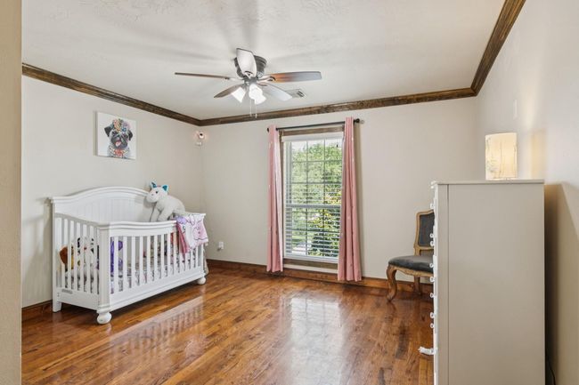 Check out the crown molding and beautiful flooring. | Image 32
