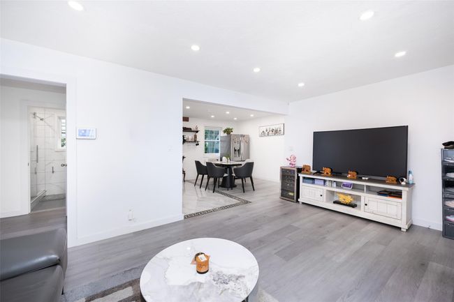 Living room featuring recessed lighting and wood finished floors | Image 6
