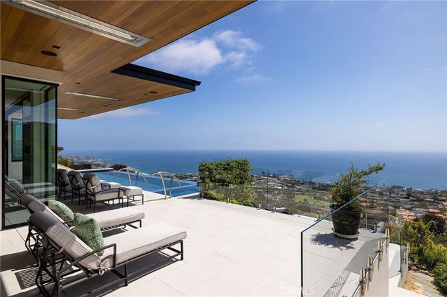 Lounge poolside on your upper entertaining terrace. | Image 5