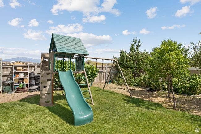 View of play area with a lawn | Image 45