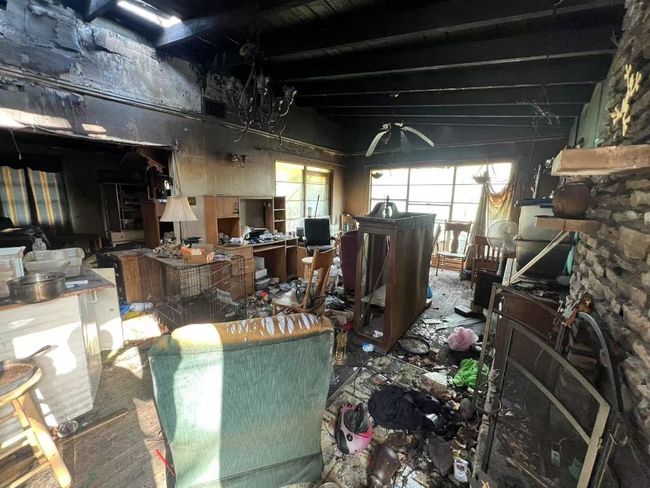 Fire Damaged Living Room and Fire Place | Image 15