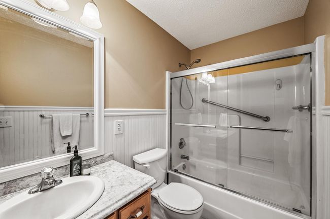 The main level bathroom is convenient to the bedroom and all other living spaces making it ideal for guests and everyday use. | Image 18
