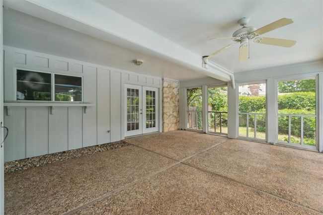 Unfurnished sunroom with french doors | Image 36