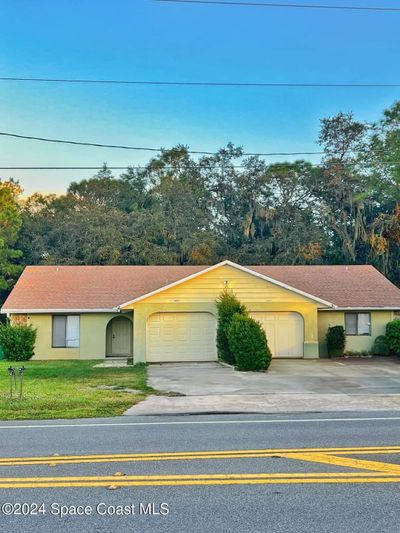 5915 Sisson Road, Home with 4 bedrooms, 4 bathrooms and null parking in TITUSVILLE FL | Image 1