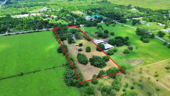 Set on one of the highest points in the neighborhood, this beautifully maintained property blends privacy, beauty, and modern comfort in every square foot. | Image 42