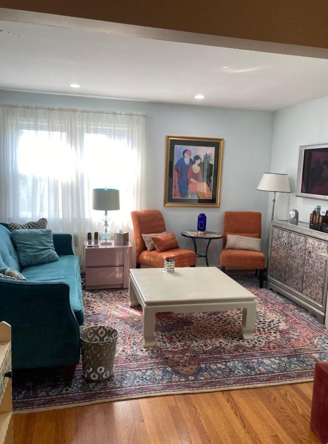 Living area featuring wood finished floors | Image 33