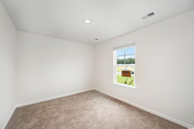 View of carpeted empty room | Image 2