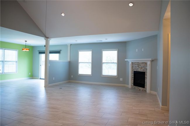 Living room has a gas fireplace | Image 23