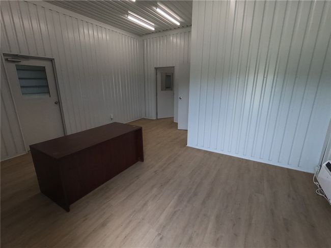 Unfurnished room featuring wood finished floors | Image 8