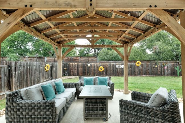 The owners add an extension to the patio with a beautiful shaded area, perfect for relaxing and taking in the views. | Image 21