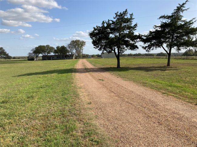 View of street with driveway and a rural view | Image 6
