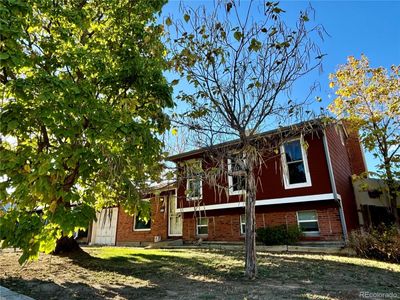 Spacious 3 bedroom 2 bath 1 car garage on a large lot backing to green belt. Close to schools! | Image 1