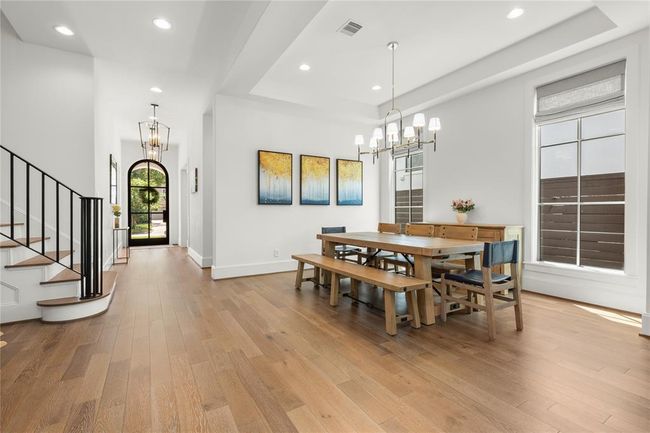 Iron stair rails & balusters, recessed lighting as well as gorgeous light fixtures throughout | Image 14
