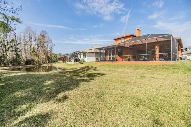 Exterior back view of the home | Image 25