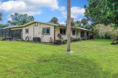 7481 Sw Citrus Boulevard, House other with 3 bedrooms, 3 bathrooms and null parking in Palm City FL | Image 2