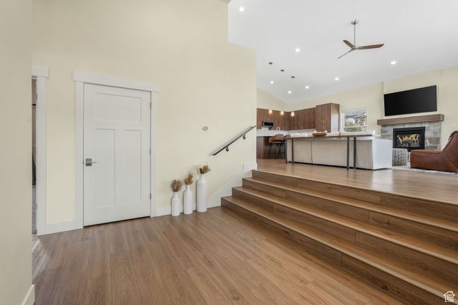 Step into a grand, welcoming entryway that effortlessly flows into the expansive living room, setting the tone for the entire home. | Image 18