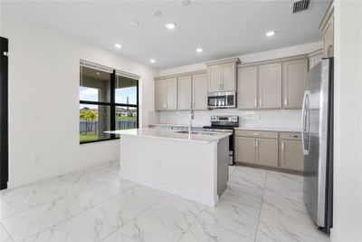 1323 Whitcombe Dr, House other with 4 bedrooms, 3 bathrooms and null parking in Royal Palm Beach FL | Image 2