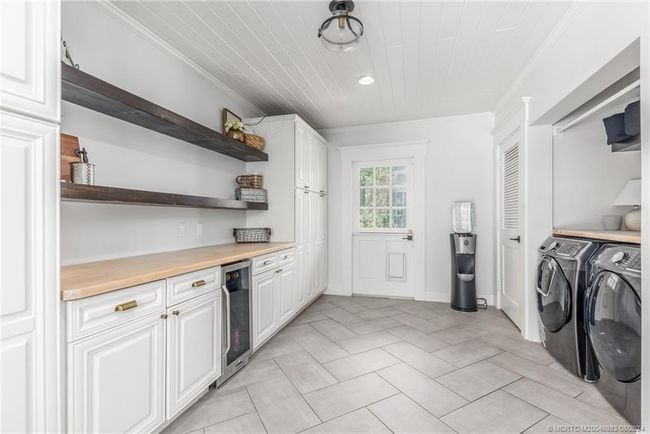 5906 Ludlum St, House other with 5 bedrooms, 5 bathrooms and 3 parking in Palm City FL | Image 38