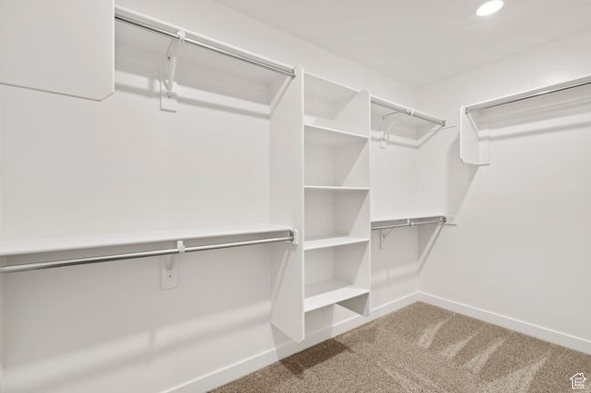 Spacious closet featuring carpet floors | Image 37