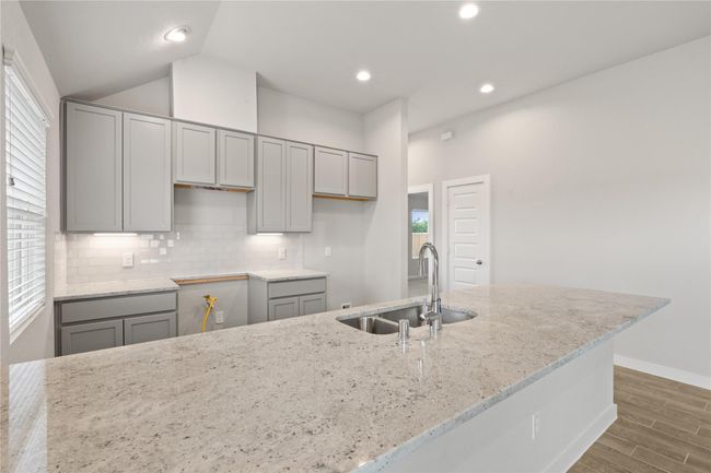 This photo is for illustrative purposes only and is not to be considered an exact replica of the finished home. Rendering does not match the finished product in terms of features, colors, landscaping, etc. Pricing, specifications, square footage and materials are subject to change at any time and without notice. | Image 4