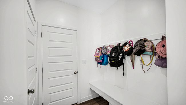 mudroom featuring dark wood-style flooring | Image 19