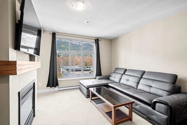 409 - 1211 Village Green Way, Condo with 1 bedrooms, 1 bathrooms and 1 parking in Squamish BC | Image 1