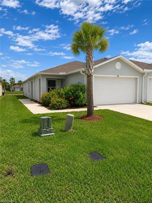 9114 Aegean Cir, LEHIGH ACRES, FL, 33936-6064 | Card Image