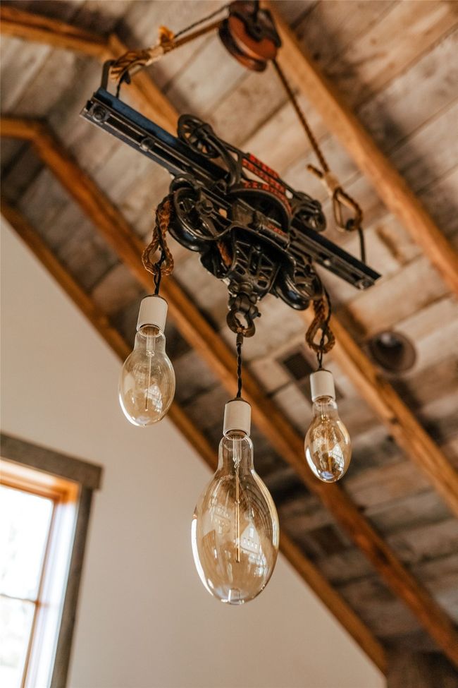 History breathes throughout the Farmstead. Implements tastefully highlight the design | Image 25