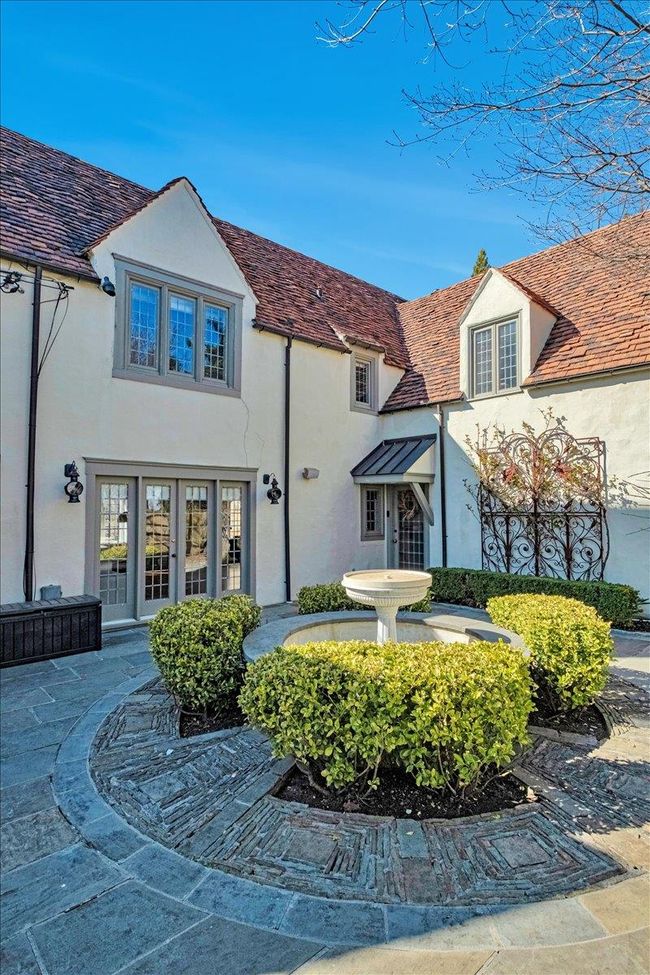 Back of house featuring working fountain. | Image 32