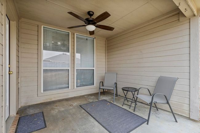 View of patio featuring ceiling fan | Image 31