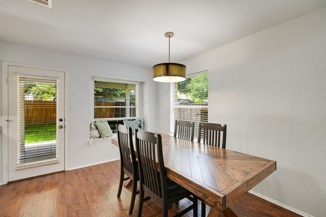 Dining room featuring wood finished floors | Image 8