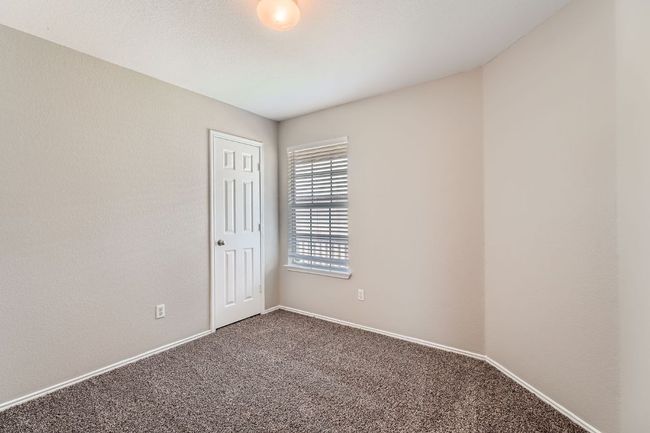 Spare room with carpet and baseboards | Image 7