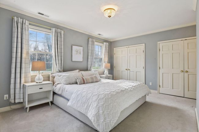 Main floor primary suite with ample closet space | Image 13